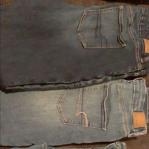 2 American eagle jeans size 14, one size 1X